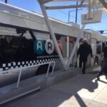 Albuquerque Rapid Transit bus stopped beside a covered station platform