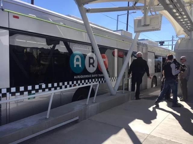Albuquerque Rapid Transit bus stopped beside a covered station platform